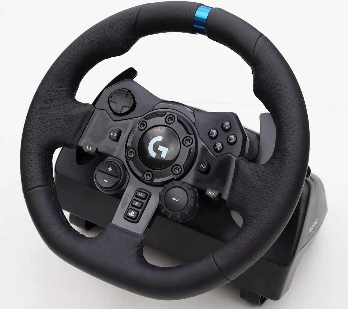 Logitech G923 steering wheel, PlayStation version, with PlayStation buttons on the hub